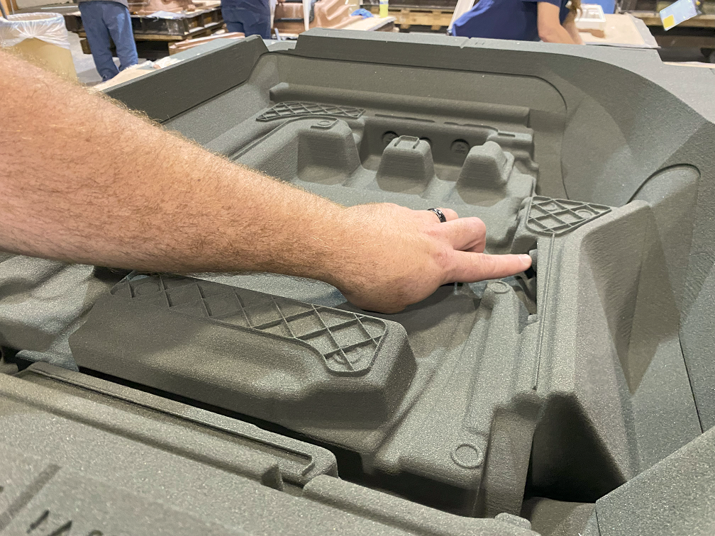 Automotive seat mold tooling cast with 3D printed sand tooling